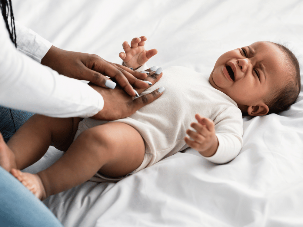 Massagem para reduzir a cólica do bebê